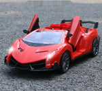 Voiture Lamborghini pour enfants sur du goudron avec ses portes ouvertes - VéhTél